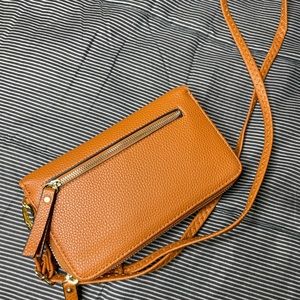 Michael Kors Pouch/Strap Designer Bag.